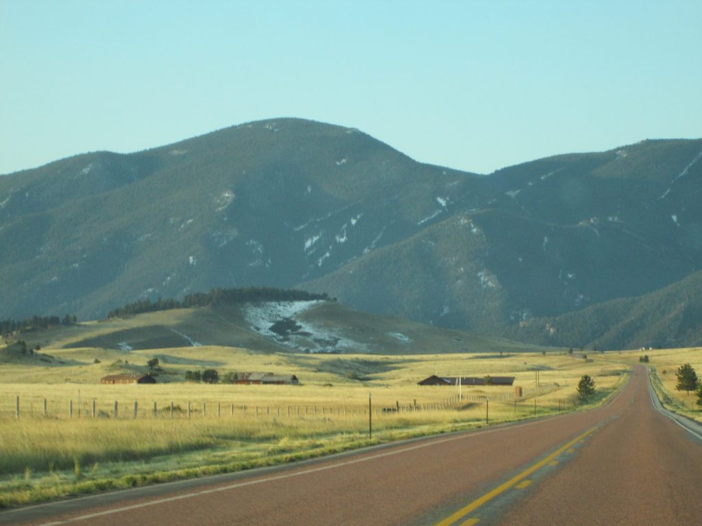 Road winding through the foothills of the Bighorn Mountains.