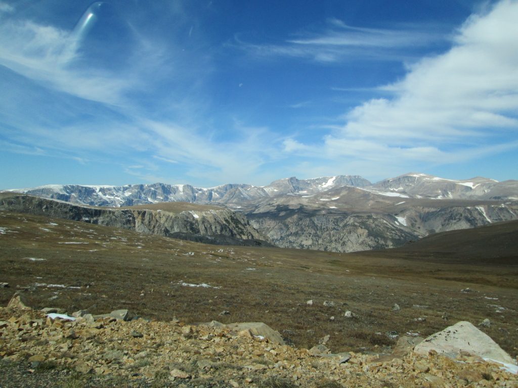 View of alpine country and low-hanging clouds on top of Beartooth Pass.